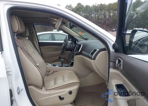 2014 Jeep Grand Cherokee Overland z USA, uszkodzony, nr VIN 1C4RJFCG8EC331303